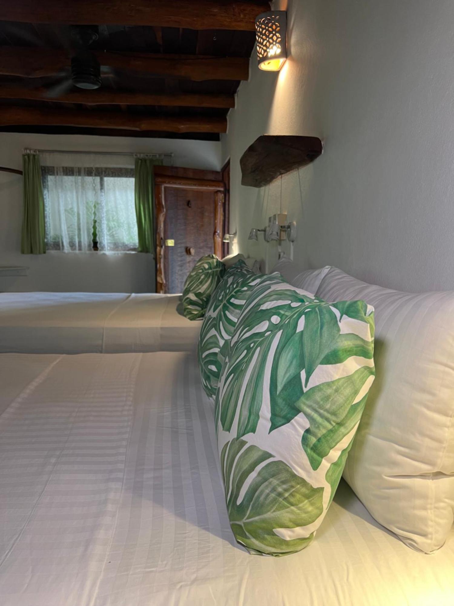 Hotel Entre Dos Aguas Samara Bagian luar foto